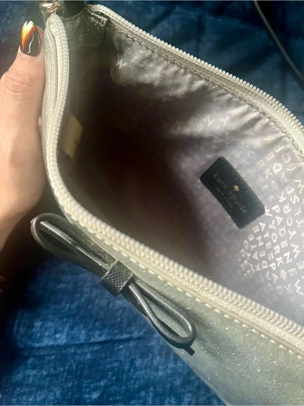 Kate Spade Silver Glitter Crossbody Bag with Bow Accent
